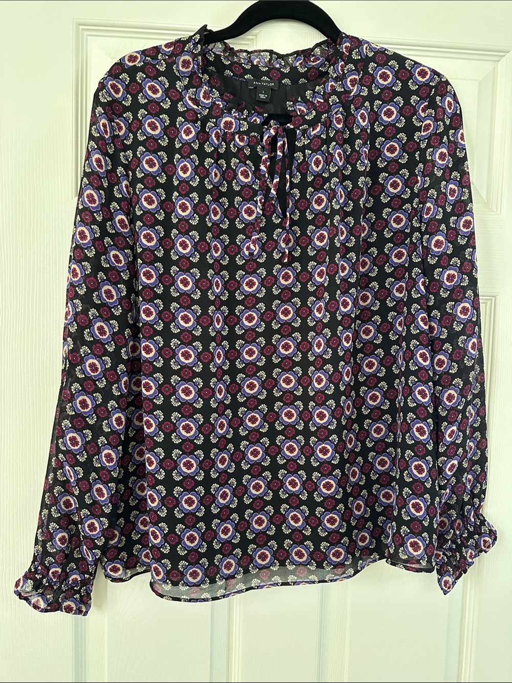 Black floral long sleeved blouse